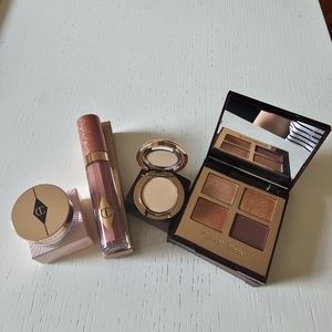 Charlotte Tilbury cosmetic eye shadows, jewel lip, mini airbrush flawless finish